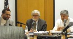 BOE dunsmoor_tschudy_tripp Oswego school board vice president Jim Tschudy, center, and president Sam Tripp, right, listen as board member John Dunsmoor makes a point regarding the proposed budget on Tuesday night.
