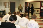 Hannibal Superintendent Mike DiFabio speaks to students as they wait for their meeting with state lawmakers. Board of Education President Dale Young is at left and district business official Nancy Henner is at right.