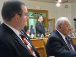 legislators Legislator Mike Kunzwiler, standing center, makes a point regarding the tentative agreement prior to the legislature’s vote Thursday night. Looking on, from left in foreground, are legislators Terry Wilbur and Morris Sorbello. In background from left are Jacob Mulcahey and Fred Beardsley.