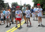During the Children’s Parade, youngsters were all decked out in their berets and hand-made T-shirts to celebrate the cultural component of Harborfest 2010 – France.