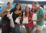 Ashley Wescott, Diana Pschierer, Brittany Petersen and Jenny Watson enjoy SUNY Oswego Night at the Oswego Farmers’ Market on Thursday.