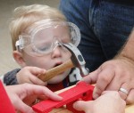 safety-nathan Nathan Hibbert of Oswego builds a wooden fire truck and learns about tool safety.