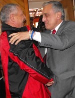 paladino supporter Carl Paladino, right, is greeted by a supporter as he enters the Press Box in Oswego this afternoon.