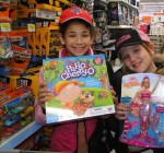 KPSHolShop (3) Kingsford Park third graders conducted their annual spell-a-thon and raised more than $3,000. Students went to Wal-Mart and purchased gifts for the holiday giving project for other children. Victoria Tripp and Hannah Reed display some of the items they selected.