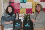 Fidelis Health Care Helps Catholic Charities Go Green Fidelis Health Care Marketing Representative, Sara Upfold-Harrell (left) presents Helen Hoefer, director of emergency services at Catholic Charities of Oswego County with re-useable bags. The bags will help Catholic Charities go green as they are distributed to those who visit the agency’s food panty.