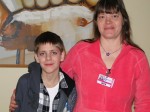GibsonLawton (3) Recently, D.J. Gibson, an Oswego Middle School seventh grader, was choking on candy while riding home on a school bus. Bus aide Lori Lawton responded and was able to dislodge the obstruction in his throat.
