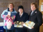 OCO Head_Pin_Fulton_SNS The honorary head pin for OCO’s Annual Bowl-a-Fun, “The Pink Guardian Angel,” visited OCO’S Senior Dining & Activity site in the Fulton Municipal Building. From left are: volunteer Meals On Wheels driver Kim Todd; Chris Sturgis, consumer; and Chris Parks, volunteer coordinator for OCO’s Senior Nutrition Services.