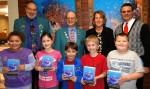 elks _FPS Dict Fitzhugh Park Elementary School third graders Jade Comstock, Karsyn Mahaney, Thomas Lee, Christian Butler and Brian Solazzo proudly display their new dictionaries. Also on hand are Elks members Jim Dillabough, Jan Pashley, FPS Principal Donna Simmons and Superintendent of Schools Bill Crist.