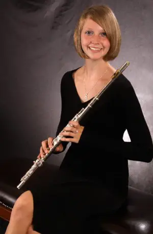 currently plays first flute and piccolo in the Wind Ensemble and in her