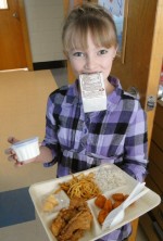 Minetto Chinese_(13) Kylie Wallace had her hands full of a variety of food items as she prepared to enjoy the meal