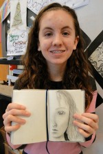 OMS art award Kayla Volkomer Kayla Volkomer, an Oswego Middle School eighth grader, was recently recognized for her talent in the Central New York Scholastic Art competition. She provides a look at her talent by displaying a piece from her sketch book.