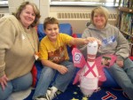 head pin__F-S-M The honorary Head Pin for OCO’s Annual Bowl-a-Fun visited Granby Elementary School recently to take part in the Fulton School Mentoring Program. From left are: volunteer manager for the Fulton School Mentoring Program, Carol Ireland; Dominik, a mentee; and Terri Richardson, a mentor with the program.