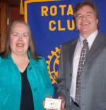 Author Stan Wilczek Talks About His Books Rotary President Carol Reed greets author Stan Wilczek.