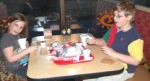 F_grill_autism event Pictured are two task force volunteers, Zeida on the left and Arlo enjoying dinner at Fajita Grill.