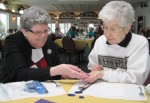 More Residents Rely On Call-N-Ride Transportation Laura Smith (left), president of Oswego County Visually Impaired, helps member Evelyn Vorse purchase some tokens to use for bus rides provided through Oswego County Opportunities Call-N-Ride. For more information about Call-N-Ride or to purchase tokens, call 1-877-4THE-BUS.