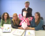 OCO Guardian Angel Considers its OPTIONS The Pink Guardian Angel discovers what it is like to be a parent as it visits OCO’s OPTIONS Program. From left are case specialists Melissa Lamb and Aimee Goulette; OPTIONS AFL coordinator Linda Eagan; and program manager Christina Piscitelli.
