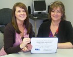 United Way Recognizes OCO Stephanie Langdon (left) and Jo-Lyn Phillips of OCO display the Certificate of Recognition that the agency received from United Way of Greater Oswego.