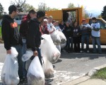 canal clean sweep preview This is a photo from last year's cleanup by a group from the college loading trash they found along the lakefront onto the trash truck donated for the day by Lee Walker. It shows the volume of trash that needs to be cleaned up each year.