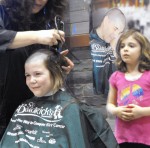 emily gets her hair cut off Emily Bradshaw gets her hair shaved off as one of her friends tries to get a closer look.