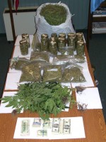 evidence__Michael J. Wiltsie__100_6942 Police reportedly seized nearly $6,000 in cash, as well as numerous other items of paraphernalia commonly used in the sale, transportation and distribution of marijuana at the suspect's home.