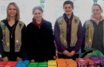 girl scout cookies Posing with their cookies are, from left: Jacqueline Hondro, Camille Graham, Paige Gray and Katherine Robinson.