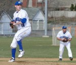 Bucs bats pitching _(6) Matt Pirro winds up while first baseman Autie Ascenzi awaits any possible action at first
