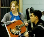 Rhode Island Sound Livens Up OHS Band Room Marikate Lamb rehearses with a member of the US Navy “Rhode Island Sound” a recent by the group to Oswego High School.