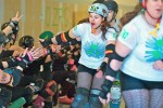 college oz rollers Derby student Katherine Hansen of the Oz Roller Girls, also known as Kannonball Kat-astrophe, is congratulated by members of the Utica Rollergirls after a recent scrimmage. She is among the SUNY Oswego students participating in the first year of the league. The home debut is April 23 in Crisafulli Rink.