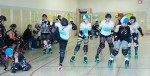 oz roller girls preview Oz Roller Girls skater Emma Draper (aka Short Fuze), left, checks an opponent out of bounds during a recent scrimmage with the Utica Rollergirls. Also shown on this jam for Oswego are, from left, Mallory Wills Taber (Abbie Cadaver), Melissa Himes (Insane Assilem) and Naomi Peacock (Gypsy). The Oz Roller Girls make their home debut at 6 p.m. April 23 vs Cortland's Crown City Royal Pains in Crisafulli Rink. (Photo: Port City Photography)