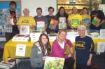 Cayuga Community College Hosts Book Drive Members of PTK at Cayuga Community College’s Fulton Campus are holding a book drive for the United Way of Greater Oswego County’s Success By 6 Program. Kneeling from left are Cralynne Abbott; Executive Director of the United Way, Melanie Trexler; and PTK advisor, Kathy Sipling. Standing from left are Corey Fleming, Virginia Buffett, Jim Coulter, Peter Rowley, Thania Reyome, Johnny Santiago, Mary Angela Fisher and Geoff Bertollini.