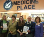 Medicine Place Helps Rock Rim Planning committee members deliver some event posters to The Medicine Place, one of the event’s major sponsors. From left are: Helen Hoefer, director of Catholic Charities’ Emergency Services program; Fran Badagnani and Erin Hess of The Medicine Place; Jim Smiley, director of Catholic Charities’ CYO Program; and Beth Lockwood of The Medicine Place.