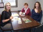 Tobacco_Coalition Danielle Wert (left), coordinator of the Rural Health Network of Oswego County, meets with Diane Oldenburg, senior public health educator (center), and Abby Jenkins, program coordinator for the Tobacco Free Network of Oswego County, to discuss the agency’s agenda to address the issue of tobacco use among women ages 14 to 24 in Oswego County.