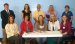 Women's_Health_Fair_Committee Planning committee members meet to finalize the details for Oswego County Opportunities’ upcoming Women’s Health Fair. Seated from left (front) are Amy Conzone RN CBPN-IC, Oswego Health, Pam Marion of Cornell Cooperative Extension, Carolyn Handville, coordinator of OCO’s Cancer Services Program, Danielle Wert, coordinator of the Rural Health Network and Katie Batchelor, program assistant with OCO’s Cancer Services Program, In back are Dr. Casey McCaffery, Abby Jenkins, program coordinator for the Tobacco Free Network of Oswego County, Kevin Kain, director of radiology at Oswego Hospital, Rebecca Bettinger of Oswego Hospital and Betty Fadden, executive director of the Fulton YMCA.
