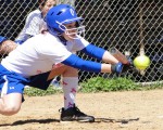sports GsoftMex_(10) Mary Montagnola lays down a bunt in recent softball action