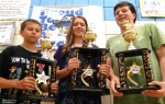 D L Trophies Proud OMS students displayed the trophies that were won at the annual Darien Lake Music Festival. Holding the trophies (from left) are Robbie Bruce, Mariah Metcalf and Mark Forger.