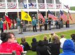FLAG flags A group of students helps the Elks display six of the flags of our nation.