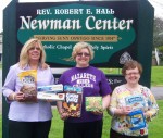 Newman Center Supports Catholic Charities People Against Poverty volunteers from the Newman Center in Oswego recently presented Catholic Charities of Oswego County with a donation in support of the agency’s food pantry. From left are: Director of Emergency Services for Catholic Charities Helen Hoefer, Laurie Brunschweiger and Meg Quigley.