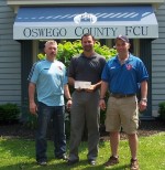 Oswego Fed_Credit Firefighters Pictured are Capt. Buddy Wilson, tournament co-chair; William Carhart, Oswego County Federal Credit Union manger and tournament corporate sponsor; and Lt. Brooks Hourigan, tournament co-chair.