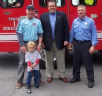 Pathfinder Bank Supports Oswego Firefighters Pictured from left: Lt. Brooks Hourigan tournament co-chair; Beverly Hourigan, tournament volunteer; Jim Dowd, senior vice president and chief financial officer of Pathfinder Bank; and Capt. Buddy Wilson, tournament co-chair.