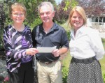 Entergy Supports The United Way Brian Finn of Entergy presents United Way of Greater Oswego County, with a check from Entergy Corporate. From left are: Executive Director of the Oswego City – County Youth Bureau and President Elect of the United Way Board of Directors, Kathy Fenlon; Finn; and Executive Director of the United Way of Greater Oswego County, Melanie Trexler.