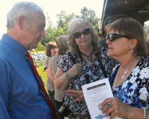 Mayor Tom Gillen chats with Joyce Lorraine, USA project manager of the International Peace Garden Foundation, center and Paula Savage, president of the group, prior to the ceremony.