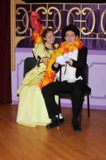 Ernestina Money (played by Katelyn Caza) makes Horace Vandergelder (portrayed by Mitch Lalik) most uncomfortable in the Harmonia Gardens Restaurant. The young lady was sent to have dinner with Mr. Vandergelder by Dolly Levi, the well-known matchmaker who is determined to find the grumpy widower a new wife. The scene is from Quirk's Players' upcoming production of Hello, Dolly! which will be performed March 7-8-9 at G. Ray Bodley High School.