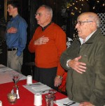 DSCF1307 Members of the Battle of the Bulge survivors’ organization of Oswego salute the flag during the Pledge of Allegiance during a recent meeting. From right to left are Len Maniccia, Tom Halpin and Colin Morgan (grandson of member Bill Hogan).