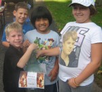 From left: Kameron Ruggles, Kyle Ruggles, Suly Jaggers and Jessica Pekow make a donation to Christie Hoefer’s Pennies 4 Pantries campaign to raise one million pennies for the food pantry at Catholic Charities of Oswego County. For their donation they held a small yard sale and collected pennies from families in their neighborhood. Collection jars can be found at area businesses. And, Christie will be at various businesses to visit with community members and accept donations.