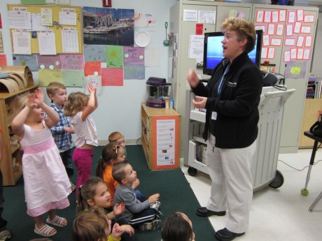 Diane talking with children about handwashing