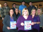 Planning Committee members for the Child Advocacy Center of Oswego County’s inaugural Chicken Wing and Micro-Brew Fest meet with some of the participating restaurants in final preparation for the event. Seated from left are: Stephanie Hammond and Jenny Donohue of DSS; Karen Perwitz, CAC board member; Karrie Damm, executive director of the CAC; and Gail Godici, CAC board member. Standing from left are: Mark Pluff of GS Steamers; Franco D’Ippolito of Franco’s Pizza; Matt Alton of Cheap Seats Bar & Grill; and Jake Mulcahey, CAC board member. Other participating restaurants include: The End Zone, Canale’s Restaurant, and Greene’s Ale House.