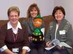 The mascot for Oswego County Opportunities’ upcoming Bowl O’Gold Bowling Tournament “Patty McGold” recently visited OCO’s Health Services Facilitated Enrollment Program. From left are: Cindy Palamar, facilitated enrollment supervisor; Penny Halstead of OCO Health Services; and Julia Smith, facilitated enrollment operations assistant.