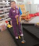 Liliana Springston smiles after making a long put on one of the tougher holes on the course.