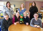 Patty McGold, the official mascot for Oswego County Opportunities’ 2012 upcoming “Bowl O’Gold” bowling tournament, recently visited OCO’s Day Habilitation program. Seated from left are: Henry Ridgeway, Dawn Robinson, Christine Vascher and Jeff Russell. Standing are staff members Allison Griffin, program manager, and Day Habilitation Assistants Amanda Fellows and Krista Lastra.