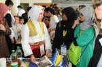Harisa Polutan of Bosnia-Herzegovina, left, talks with students from Indonesia during the first annual GENIUS Olympiad environmental science and art competition for high school age students at SUNY Oswego's Hewitt Union ballroom. Entries have begun coming in for the 2012 GENIUS Olympiad, with a March 26 deadline.